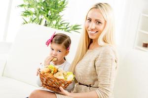 Cute Mom And Daughter With Pastries photo