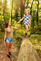 Young Woman And Little Girl In The Forest photo