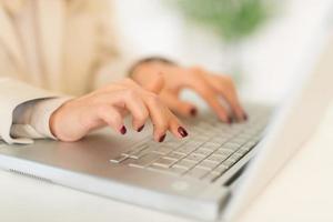 Businesswoman Working On Laptop photo