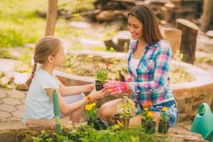 Mother And Daughter In Garden photo