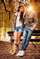 Couple Enjoying In Autumn photo