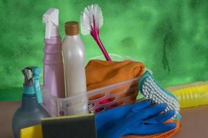 basket with cleaning products for home hygiene use photo