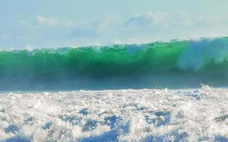 Extremely huge big surfer waves at beach Puerto Escondido Mexico. photo