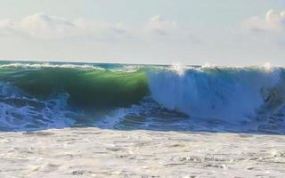 Extremely huge big surfer waves at beach Puerto Escondido Mexico. photo