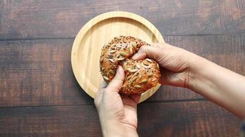 Nutty bread parted with hands video