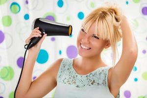 Girl Making Hairstyle photo