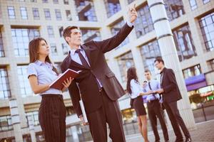 Young Businessman With His Secretary photo