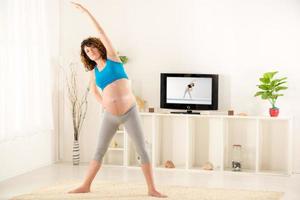 Pregnant Woman Doing Exercises photo