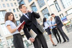 Young Businessman With His Secretary photo