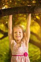 Cute little girl in the park photo