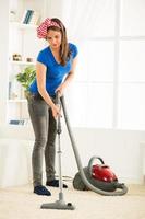 Vacuuming at home photo