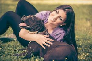 Girl Playing With Dog photo