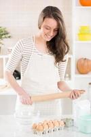 Happy Young Woman In The Kitchen photo