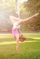 Handstand  Exercise On Grass photo