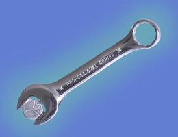 wrench on a blue background photo