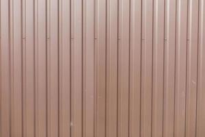 Steel fence in detail. Fence made of metal profile. Durable material to protect against prying eyes. photo