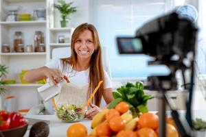 Attractive Blogger Girl Making Video For You photo