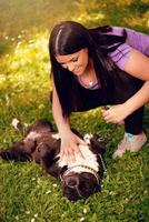 Girl Playing With Dog photo