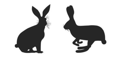 A set of silhouettes of a jumping and sitting hare or rabbit. The animal is sitting, running. Vector illustration or rabbit or bunny.