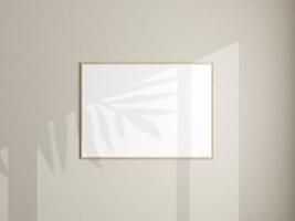 Photo frame mockup hanging on white wall. Minimalist background. Blank picture frame mockup in living room. Poster mockup. Clean, modern, minimal frame. 3d rendering.