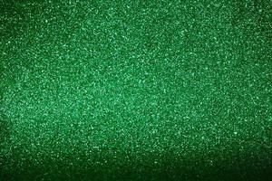 Green shiny background with shading. Christmas, New Year, Spring or Summer Holidays. Copy space photo