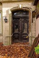 door of an old abandoned house photo