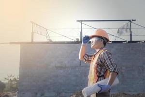 Portrait of an attractive worker on a construction site photo