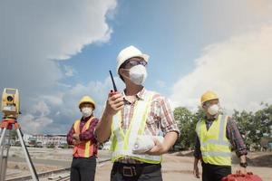 Team engineers and worker of three site   construction on background photo