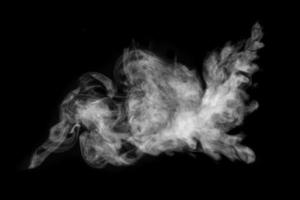 Abstract  powder or smoke isolated on black background photo