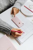 Woman planning in her diary photo