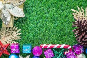 Christmas decoration on green grass with copy space photo