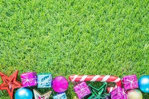 Christmas decoration on green grass with copy space photo