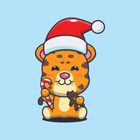 Cute leopard eating christmas cookies and candy. Cute christmas cartoon illustration. vector