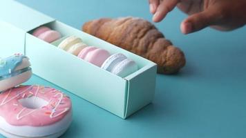 Beautiful pastries, macarons, donuts and a croissant video