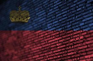 Liechtenstein flag  is depicted on the screen with the program code. The concept of modern technology and site development photo
