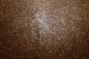Pattern of 12 gauge cartridges for shotgun bullets. Shells for hunting rifle close up. Backdrop for shooting range or ammunition trade concepts photo