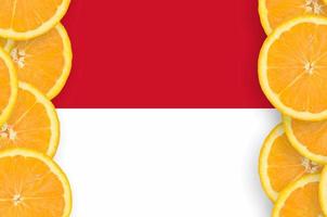 Indonesia flag  in citrus fruit slices vertical frame photo