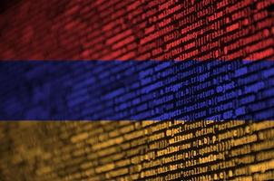 Armenia flag  is depicted on the screen with the program code. The concept of modern technology and site development photo