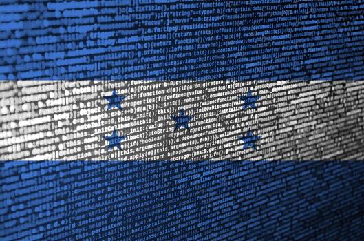 Honduras flag  is depicted on the screen with the program code. The concept of modern technology and site development photo