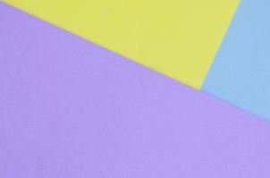 Texture background of fashion pastel colors. Violet, yellow, and blue geometric pattern papers. minimal abstract photo