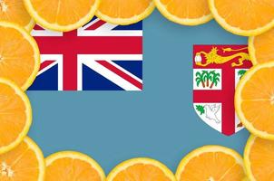 Fiji flag  in fresh citrus fruit slices frame photo