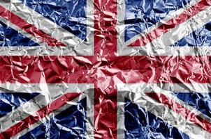 Great britain flag depicted in paint colors on shiny crumpled aluminium foil closeup. Textured banner on rough background photo