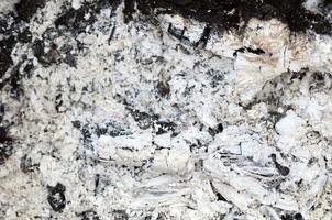 Pile of ashes after the fire went out grunge background texture photo