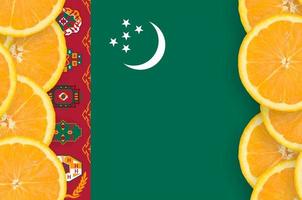 Turkmenistan flag  in citrus fruit slices vertical frame photo