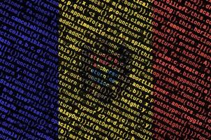 Moldova flag  is depicted on the screen with the program code. The concept of modern technology and site development photo