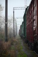 Photo of the train on rainy cloudy weather with shallow depth of field