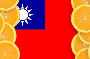 Taiwan flag  in citrus fruit slices vertical frame photo