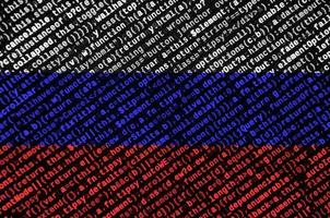 Russia flag  is depicted on the screen with the program code. The concept of modern technology and site development photo