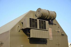 Close up of green military truck. Modern military transportation vehicle technologies photo