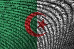 Algeria flag  is depicted on the screen with the program code. The concept of modern technology and site development photo